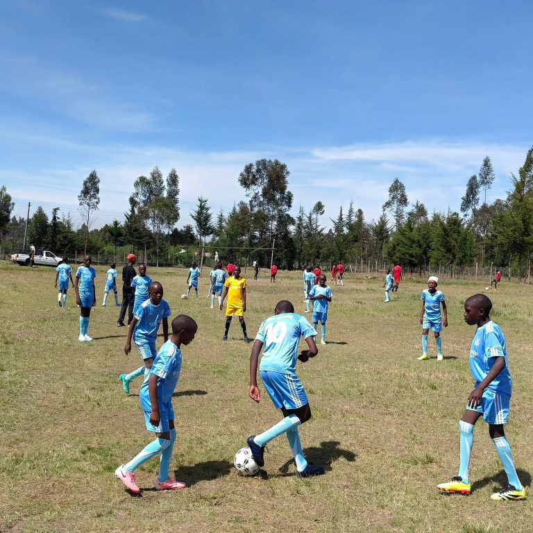 Boys playing football
