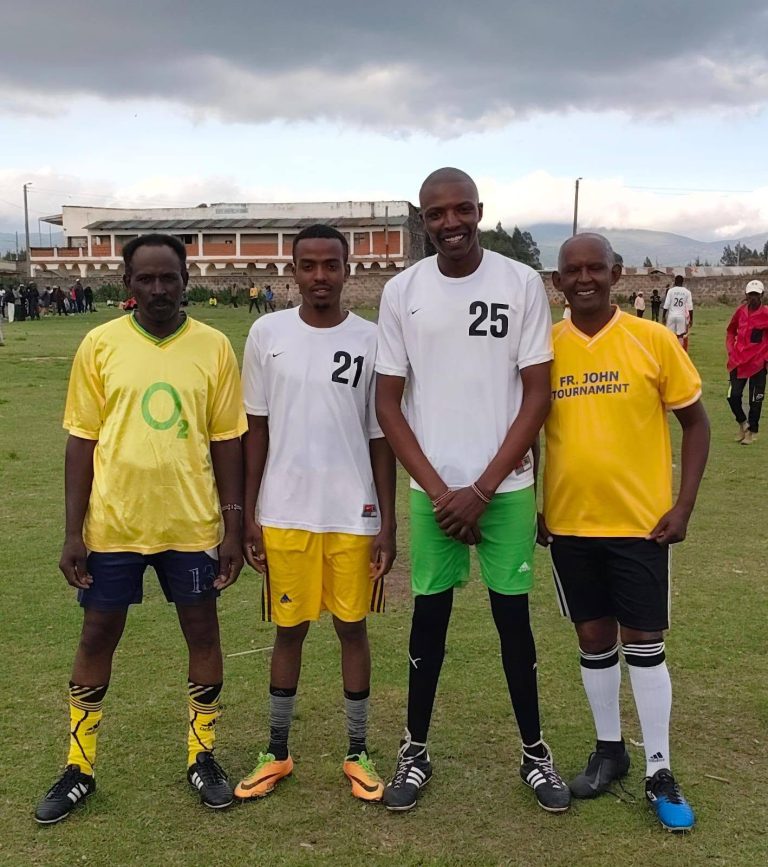 Graduates and mentors on the pitch