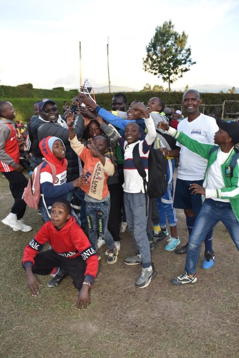 Families and boys at an outreach event